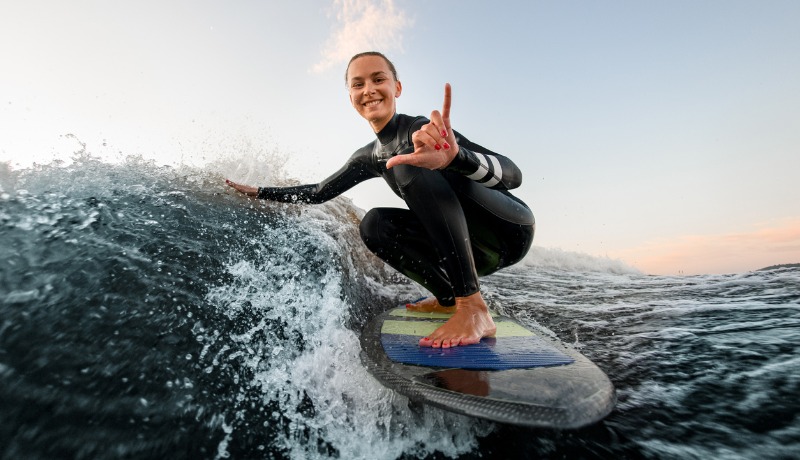 sensory experience of surfing with a smail on your face